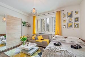 Posteľ alebo postele v izbe v ubytovaní Castle Cozy Apartment