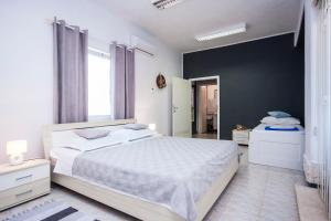 Postel nebo postele na pokoji v ubytování House KALA