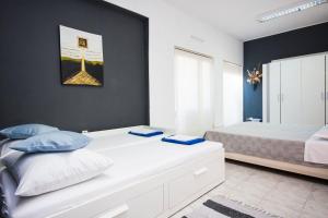Postel nebo postele na pokoji v ubytování House KALA + 32 fotografií