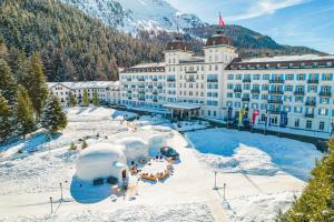 an aerial view of a building in the snow at Grand Hotel des Bains Kempinski in St. Moritz
