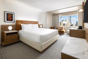 Postel nebo postele na pokoji v ubytování Hyatt Regency Times Square