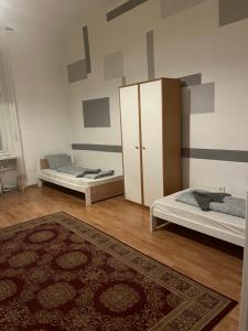 A bed or beds in a room at Palace district rooms