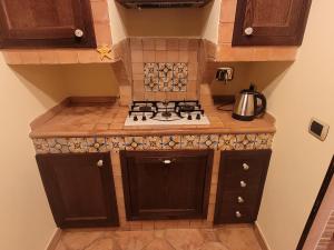 an overhead view of a kitchen with a stove at Alloggio turistico Giulia in Albano Laziale +11 photos
