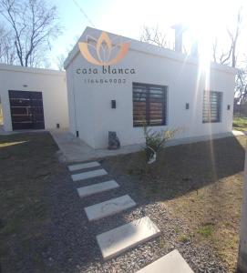 a building with a sign that reads casa blanca at Casablanca in Cañuelas
