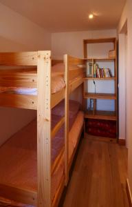 En eller flere senge i et værelse på La Grande Cordée - Cœur d'Alpage