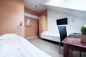 TV o dispositivi per l'intrattenimento presso Pronova Hotell & Vandrarhem
