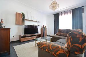 TV a/nebo společenská místnost v ubytování Casa Gaviota