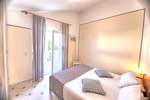 Posteľ alebo postele v izbe v ubytovaní Apartment Rosa