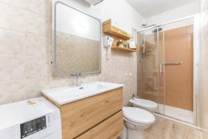 a bathroom with a sink and a toilet and a shower at Nel Borgo Antico in Riomaggiore
