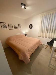 Ένα ή περισσότερα κρεβάτια σε δωμάτιο στο Grace Apartment 6