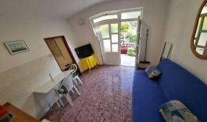 TV a/nebo společenská místnost v ubytování Apartment Vido