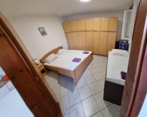 Postel nebo postele na pokoji v ubytování Apartment Vido
