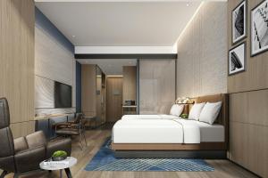 Letto o letti in una camera di Four Points by Sheraton Hengyang Zhengxiang