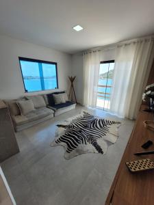 Galería fotográfica de Casa a beira-mar en Arraial do Cabo