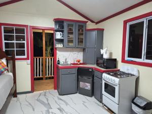 Eldhús eða eldhúskrókur á Le Blanc Hideaway +26 myndir