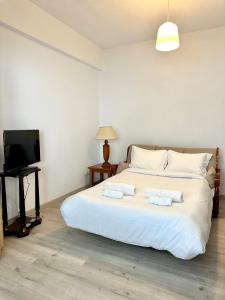 Postel nebo postele na pokoji v ubytování K&K Apartment