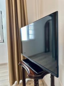 TV a/nebo společenská místnost v ubytování K&K Apartment + 15 fotografií