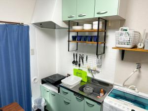 Η κουζίνα ή μικρή κουζίνα στο Belmont 301 3min to Station Easy Access Ueno Asakusa Skytree Sleeps 5