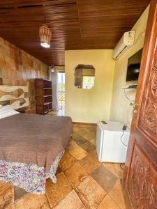 Postel nebo postele na pokoji v ubytování Pousada Tapera
