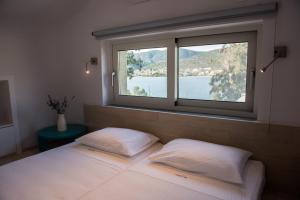 Postel nebo postele na pokoji v ubytování Lavender Cove