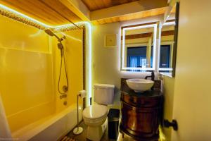 a bathroom with a toilet and a sink at Mountain Serenity, near Ski, Golf, Casino, Lake in Stateline