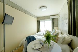TV a/nebo společenská místnost v ubytování DeLIGHT HOTEL