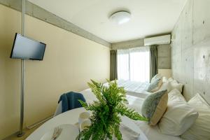 TV a/nebo společenská místnost v ubytování DeLIGHT HOTEL