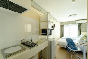 TV a/nebo společenská místnost v ubytování DeLIGHT HOTEL