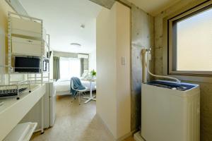 TV a/nebo společenská místnost v ubytování DeLIGHT HOTEL