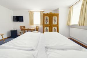 Voodi või voodid majutusasutuse Hotel Alt-Ringlein toas