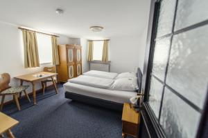 Voodi või voodid majutusasutuse Hotel Alt-Ringlein toas +37 fotot