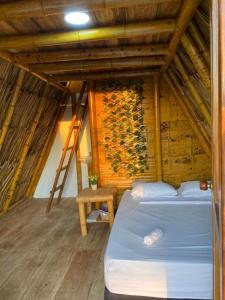 Postel nebo postele na pokoji v ubytování Awala Beach Club