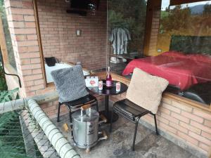 Posezení v ubytování Glamping Cabaña Pacha Neusa