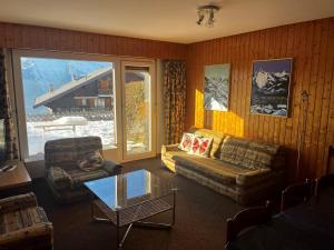 Posezení v ubytování Apartment in Veysonnaz near Ski Lift