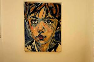 a painting of a woman hanging on a wall at 'The Gardenia' Trentham in Trentham