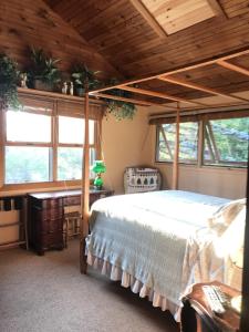 Ένα ή περισσότερα κρεβάτια σε δωμάτιο στο 4BR ski on ski off Hunter Mountain Highlands Condo