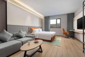 Area soggiorno di Days Inn by Wyndham Xi'an Yanliang