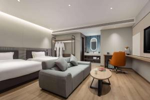 Letto o letti in una camera di Days Inn by Wyndham Xi'an Yanliang