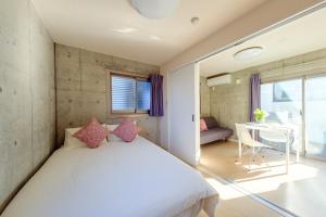 Postel nebo postele na pokoji v ubytování DeLIGHT HOTEL