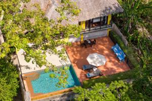 an overhead view of a house with a swimming pool at SAii Phi Phi Island Village in Phi Phi Islands