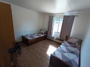 Postel nebo postele na pokoji v ubytování Complejo San Luis