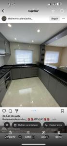 a view of a kitchen with an empty counter top at Punta cana in El Seis