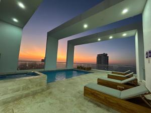 卡塔赫纳APARTAMENTO MAGNO LOFT Bocagrande的美景别墅 - 带游泳池