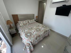 Postel nebo postele na pokoji v ubytování Apartamento Bocagrande Magno Loft + 23 fotografií