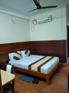 Postel nebo postele na pokoji v ubytování Hotel Embassy