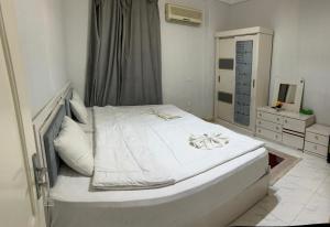 Voodi või voodid majutusasutuse Pharaohs Oasis Hotel toas