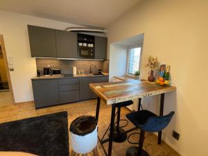 Kuchyňa alebo kuchynka v ubytovaní Apartment NAVI- Modern studio in Krkonoše foothills