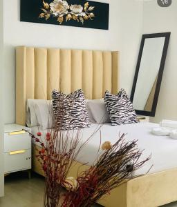 En eller flere senge i et værelse på Shibar farm house Mpumalanga