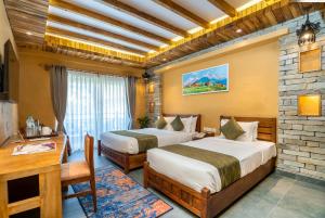 Ένα ή περισσότερα κρεβάτια σε δωμάτιο στο Bar Peepal Resort
