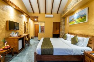 Ένα ή περισσότερα κρεβάτια σε δωμάτιο στο Bar Peepal Resort